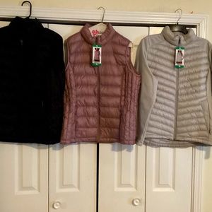 NEVER WORN.  Ski Jacket with sleeves (1) and Ski Vests (2).